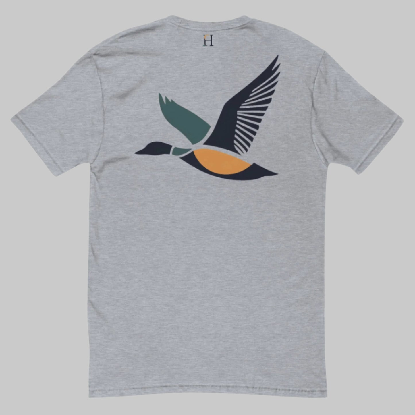 Back of Drake Edition T-Shirt in grey with dark blue, yellow, and green flying duck design and FH logo near collar.