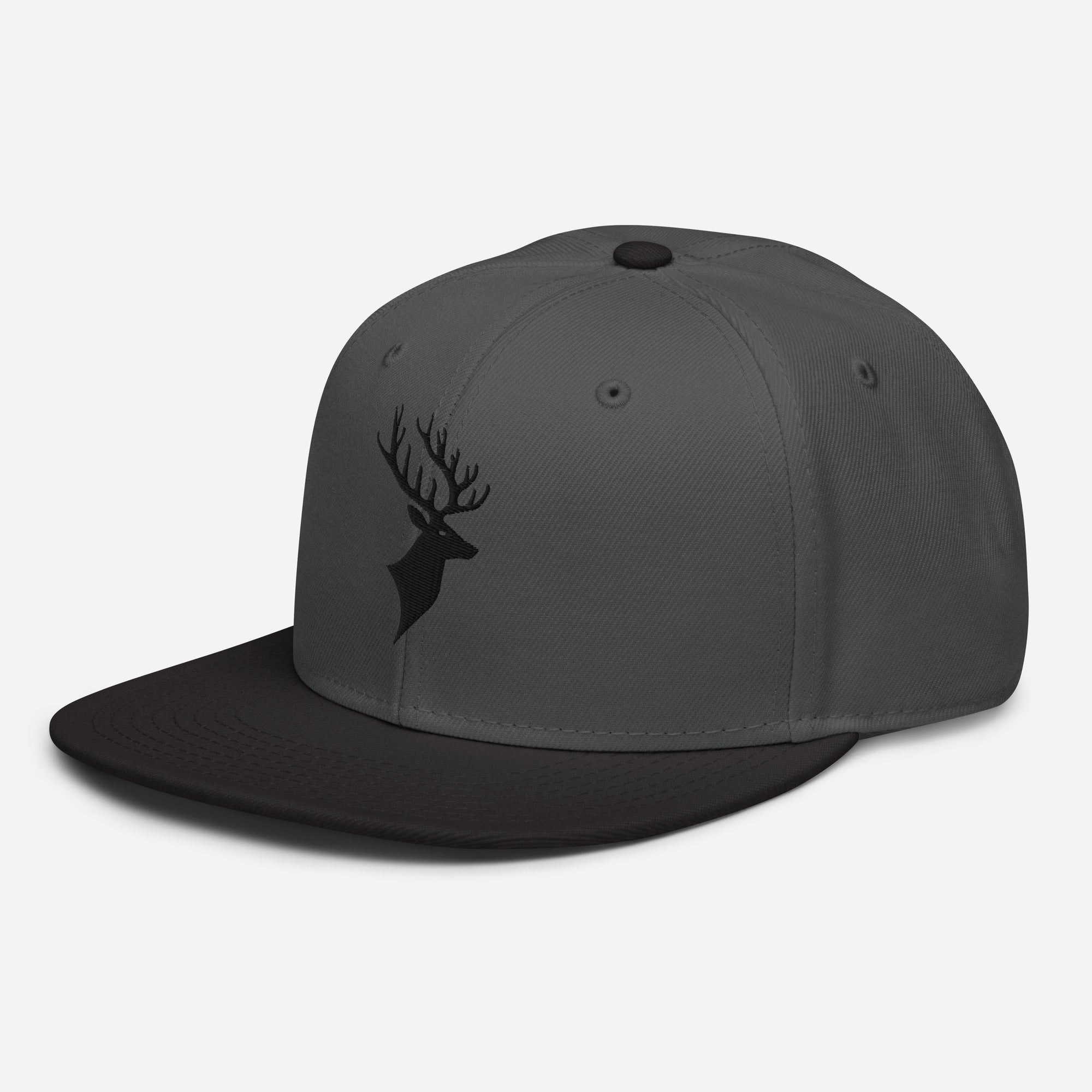 Left Front of Buck Snapback Hat in Charcoal Grey with black visor, and black Deer head embroidery on front.