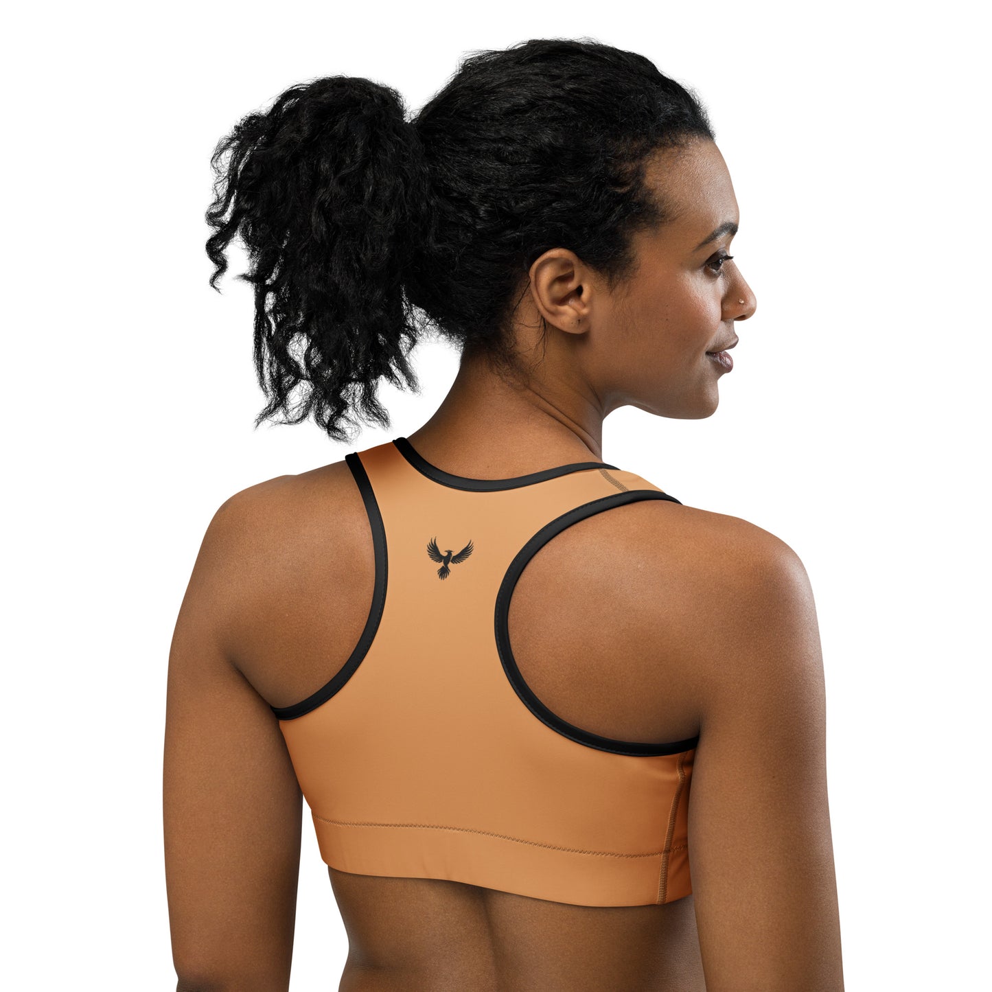 Back of Woman wearing Fearless Stride Sports Bra in Porsche with Black Trim, with Phoenix logo on upper center in black.