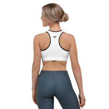 Back of Woman wearing Performance Sports Bra in White with Black Trim, with Phoenix logo on upper center in black.
