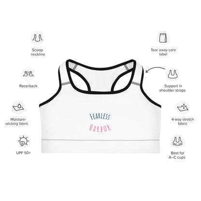 Front of Performance Sports Bra in White with Black Trim, with the text Fearless in Blue and Harbor in Pink.