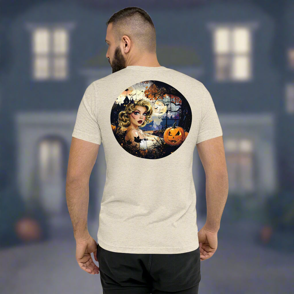 Back view of man wearing Enchanted Night Siren Tee in Oatmeal, featuring vintage haunted night design.