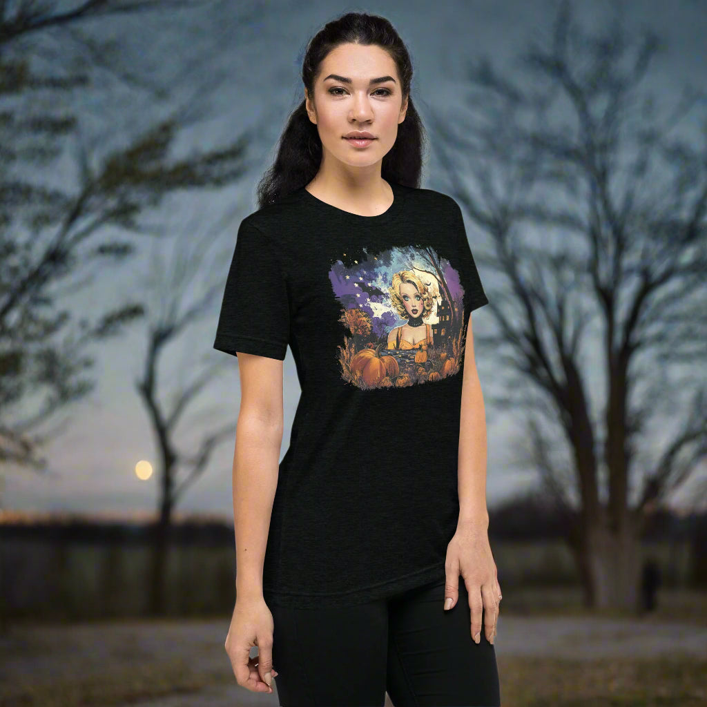 Front view of woman wearing Midnight Forest Muse Tee in Black, featuring vintage haunted midnight forest design for Halloween.